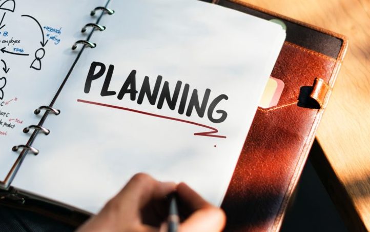 photo of "Planning" written in blank notebook